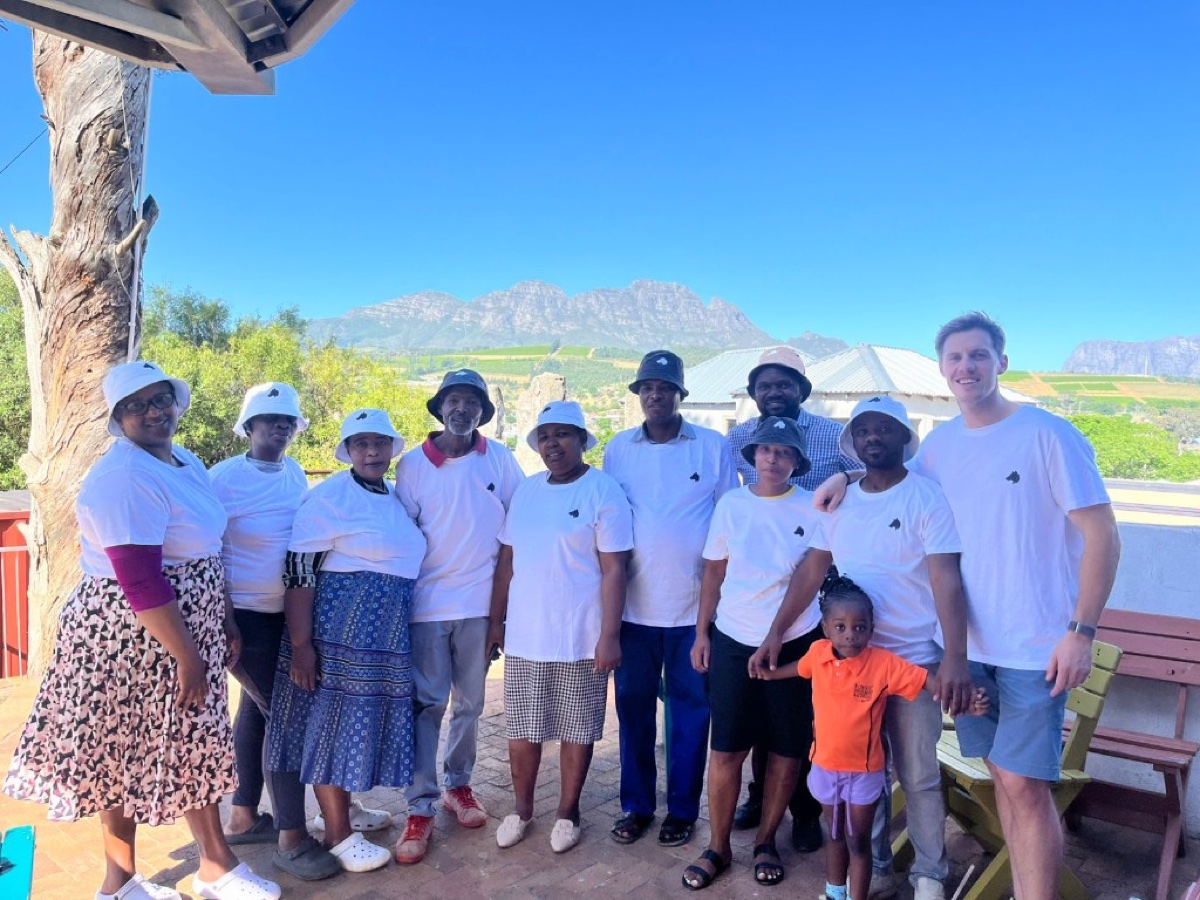 Team and community members at the first Secure Community activation in Kayamandi.